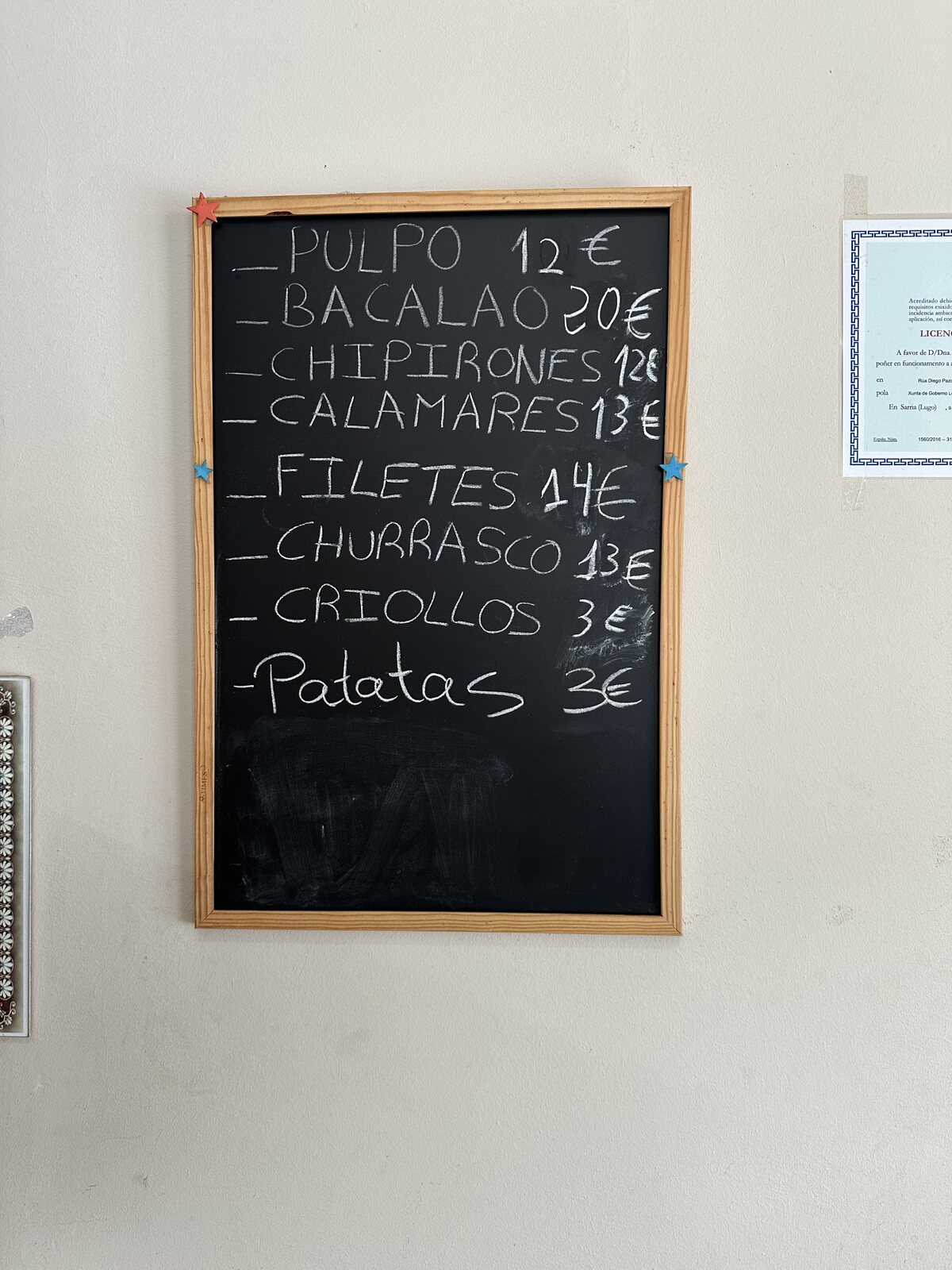 黑板上的價目：PULPO 12€